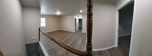 a view of hallway with stairs