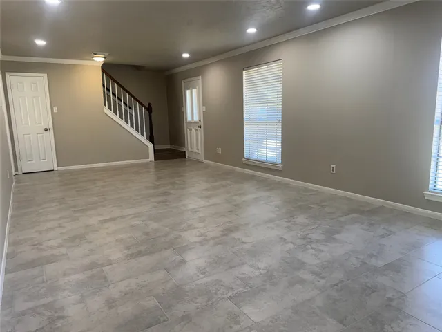 an empty room with windows