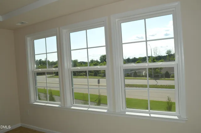 a view of a room that has a window