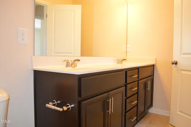 a sink with a mirror