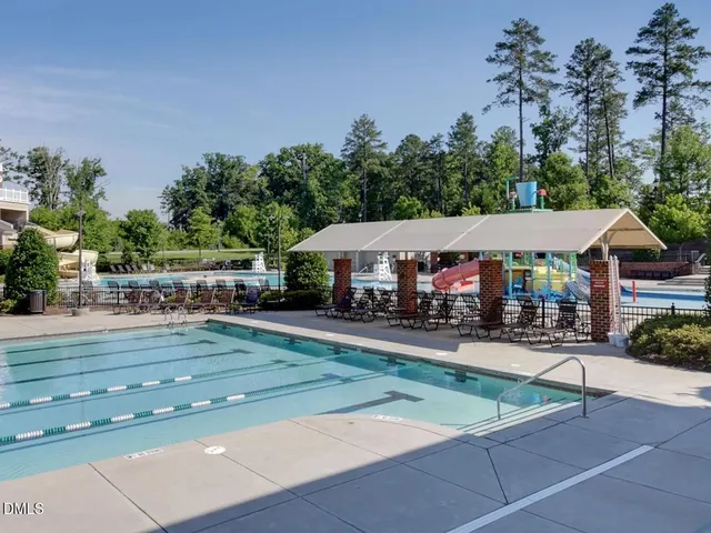an aerial view of a house with outdoor space