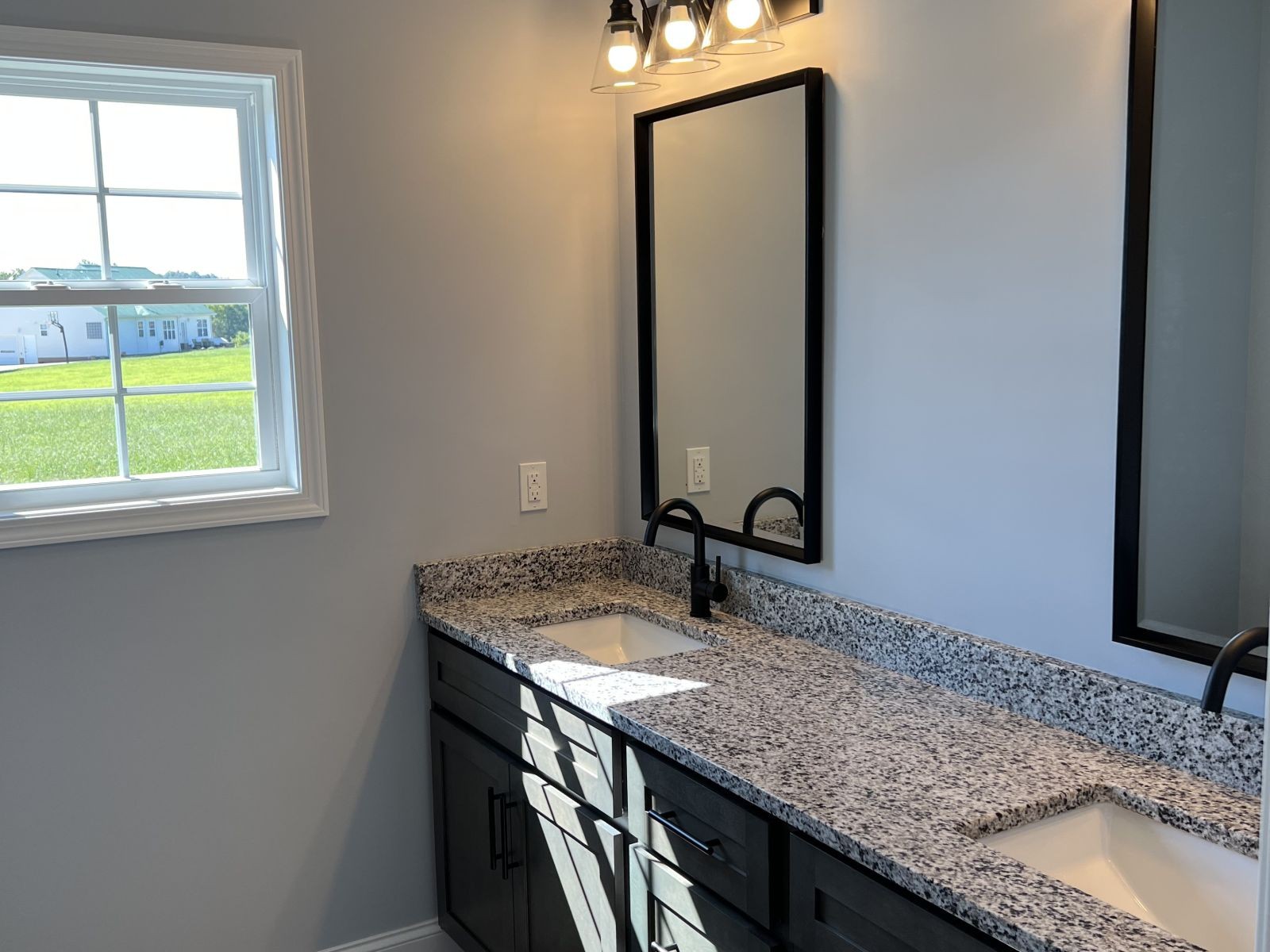 158 Faith-Rae Boulevard Morrison, TN 37357 - Photo 7 of 10 a bathroom with a granite countertop sink and a mirror