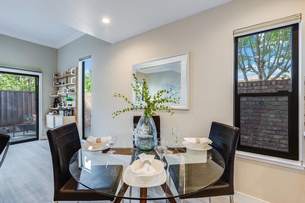 800 Rue Montagne Campbell, CA 95008 - Photo 12 of 53 a view of a dining room with furniture window and wooden floor