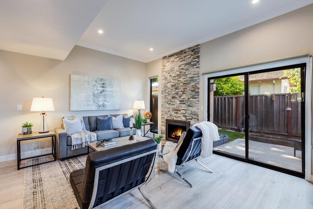 800 Rue Montagne Campbell, CA 95008 - Photo 14 of 53 a living room with furniture and a fireplace