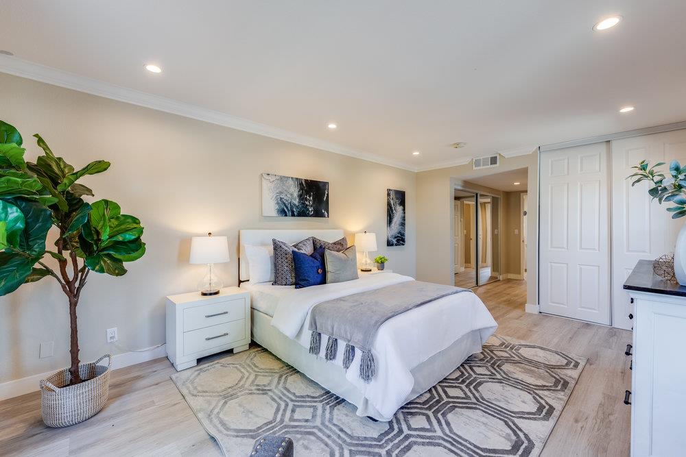 800 Rue Montagne Campbell, CA 95008 - Photo 25 of 53 a bedroom with a bed and a potted plant