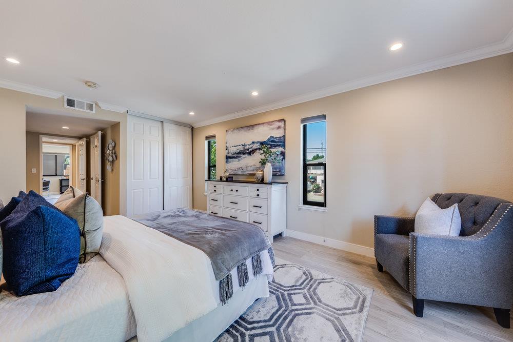 800 Rue Montagne Campbell, CA 95008 - Photo 26 of 53 a spacious bedroom with a bed and couch