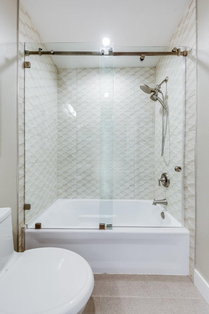 800 Rue Montagne Campbell, CA 95008 - Photo 35 of 53 a bathroom with a bathtub and a shower