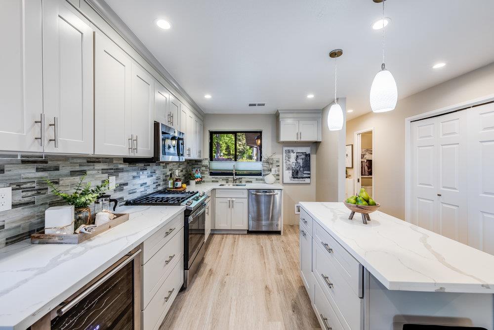 800 Rue Montagne Campbell, CA 95008 - Photo 7 of 53 a kitchen with a sink stove cabinets and refrigerator