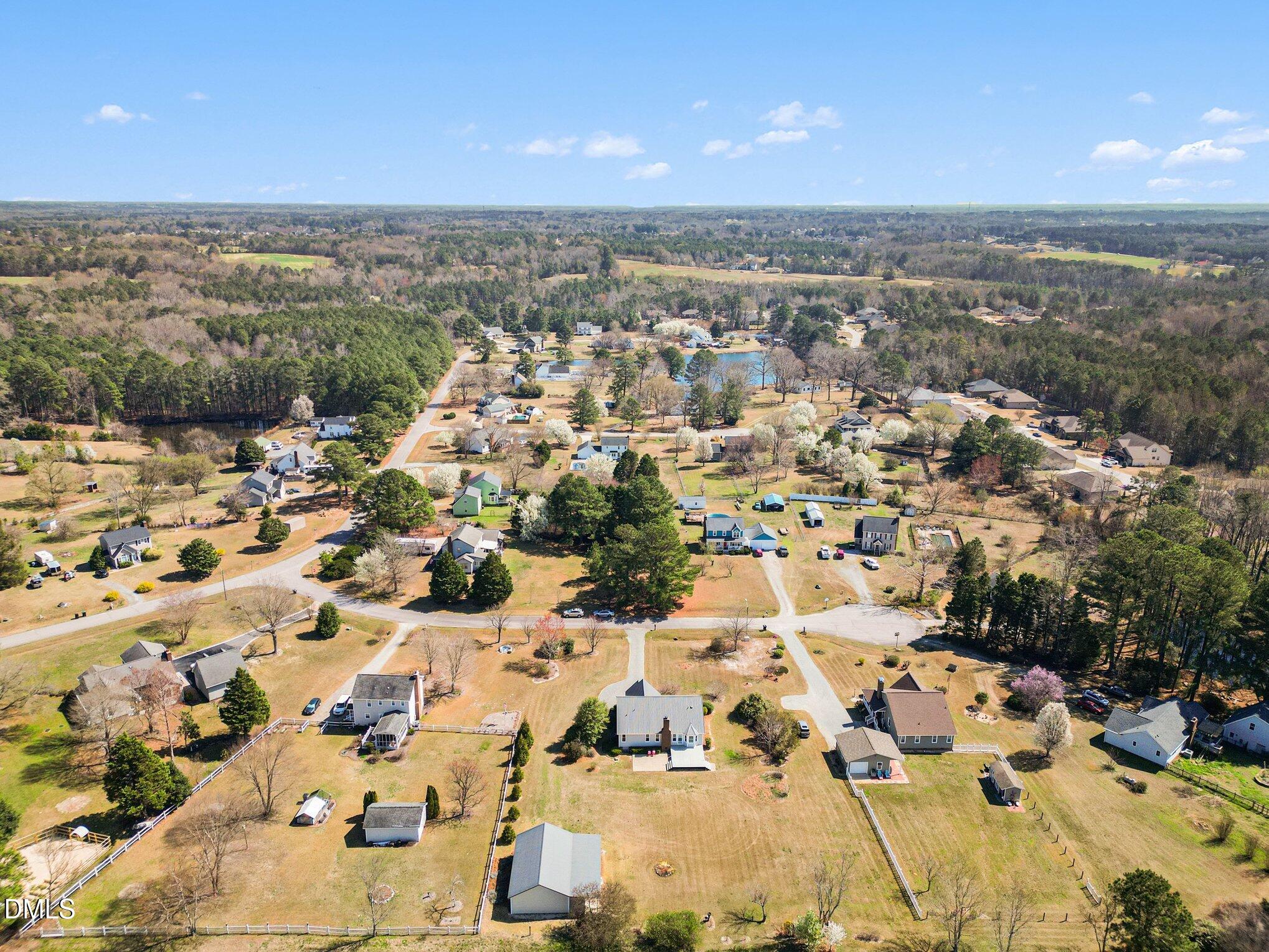 2004 Little Pond Place Willow Spring, NC 27592 - Photo 26 of 32 an aerial view of residential houses with outdoor space