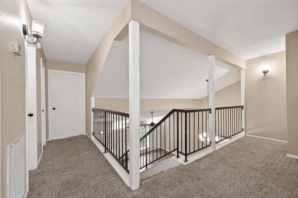 a view of room with window and ceiling fan