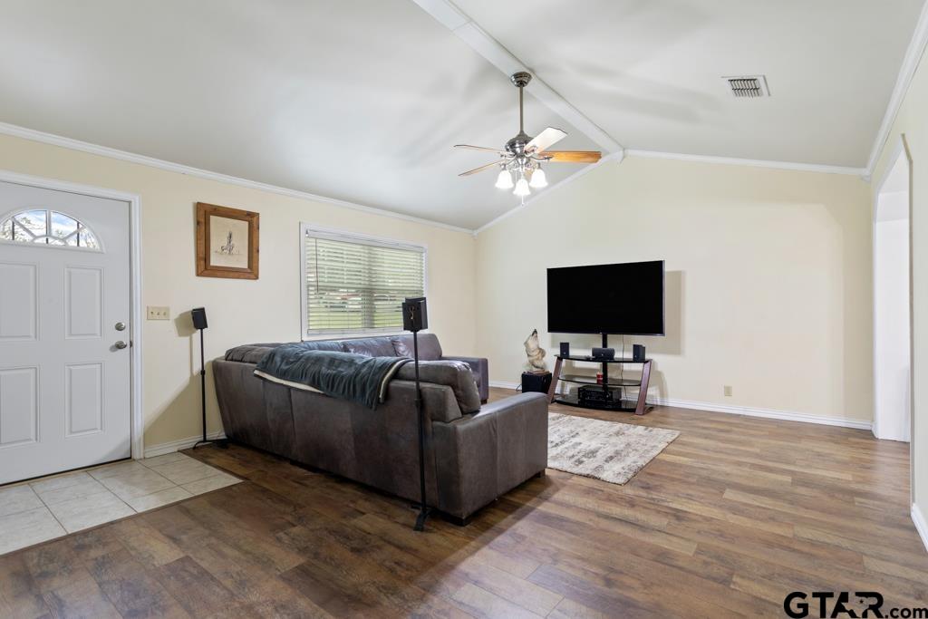 448 North Hill Road Tyler, TX 75706 - Photo 13 of 30 a living room with furniture and a flat screen tv