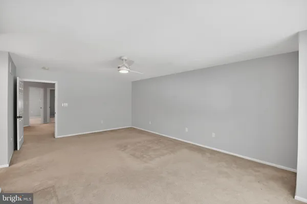 a bathroom with a double vanity sink and mirror