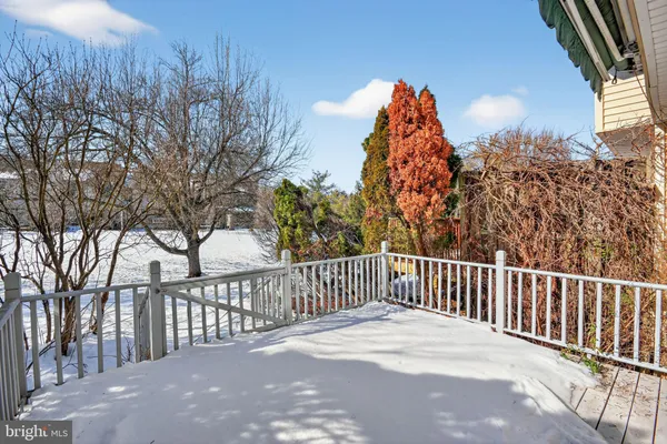 a view of a garage with wooden floor