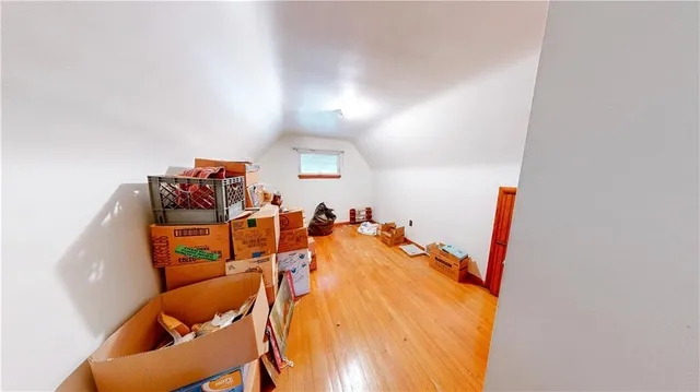 view of a room with furniture and wooden floor