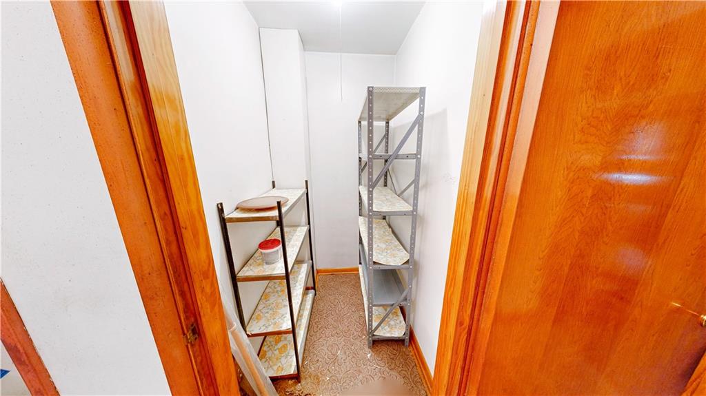 1022 Melrose Avenue Ambridge, PA 15003 - Photo 19 of 39 a bathroom with a toilet and a shower curtain