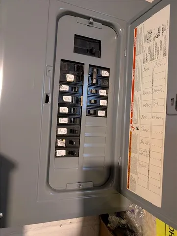 a view of a house with a yard and garage