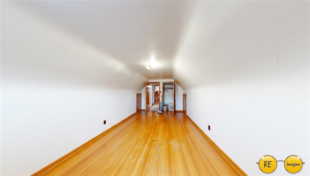 1022 Melrose Avenue Ambridge, PA 15003 - Photo 38 of 39 a view of empty room with wooden floor