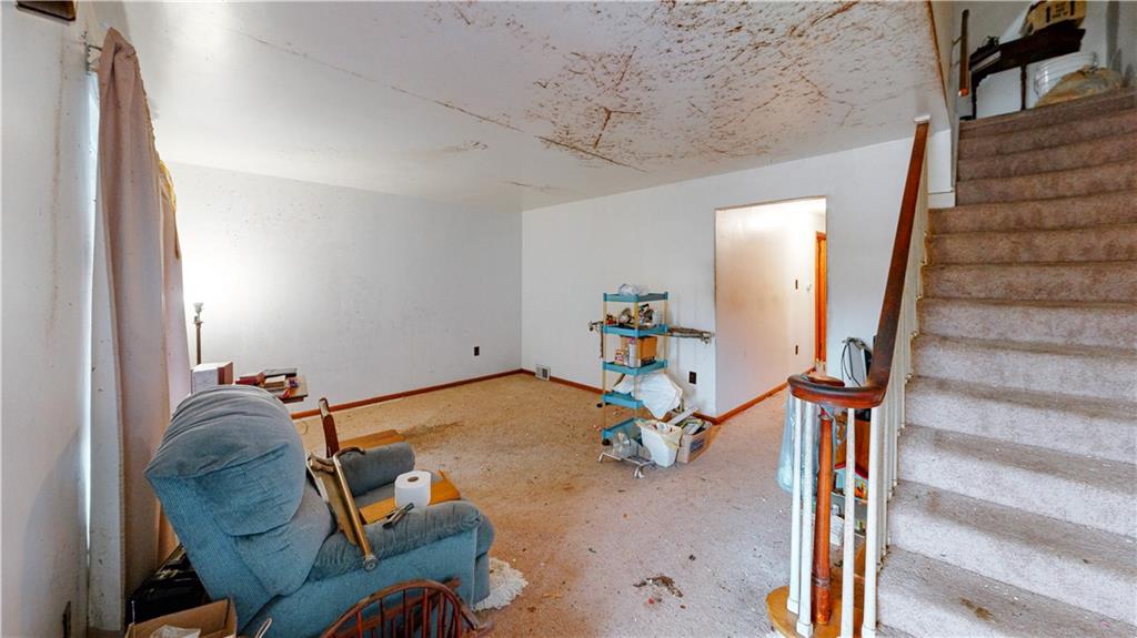 1022 Melrose Avenue Ambridge, PA 15003 - Photo 7 of 39 a view of staircase with furniture and stairs