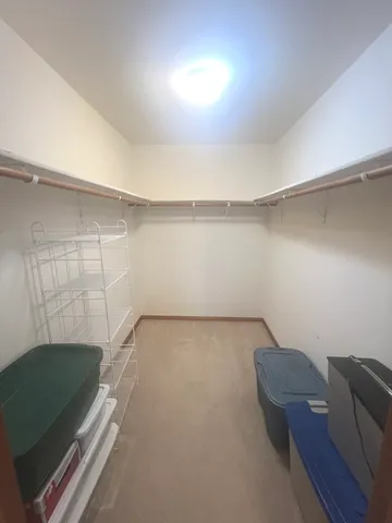 a room with a couch and a window