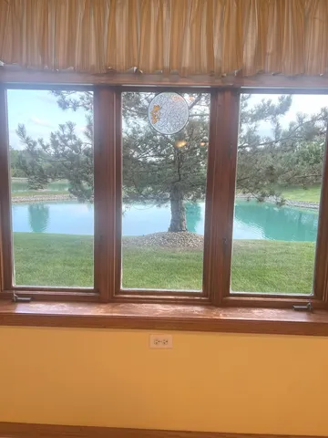 a view of a window and lake view