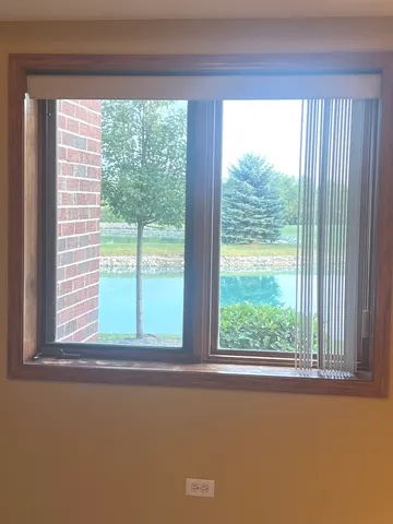 a view of a room that has a window