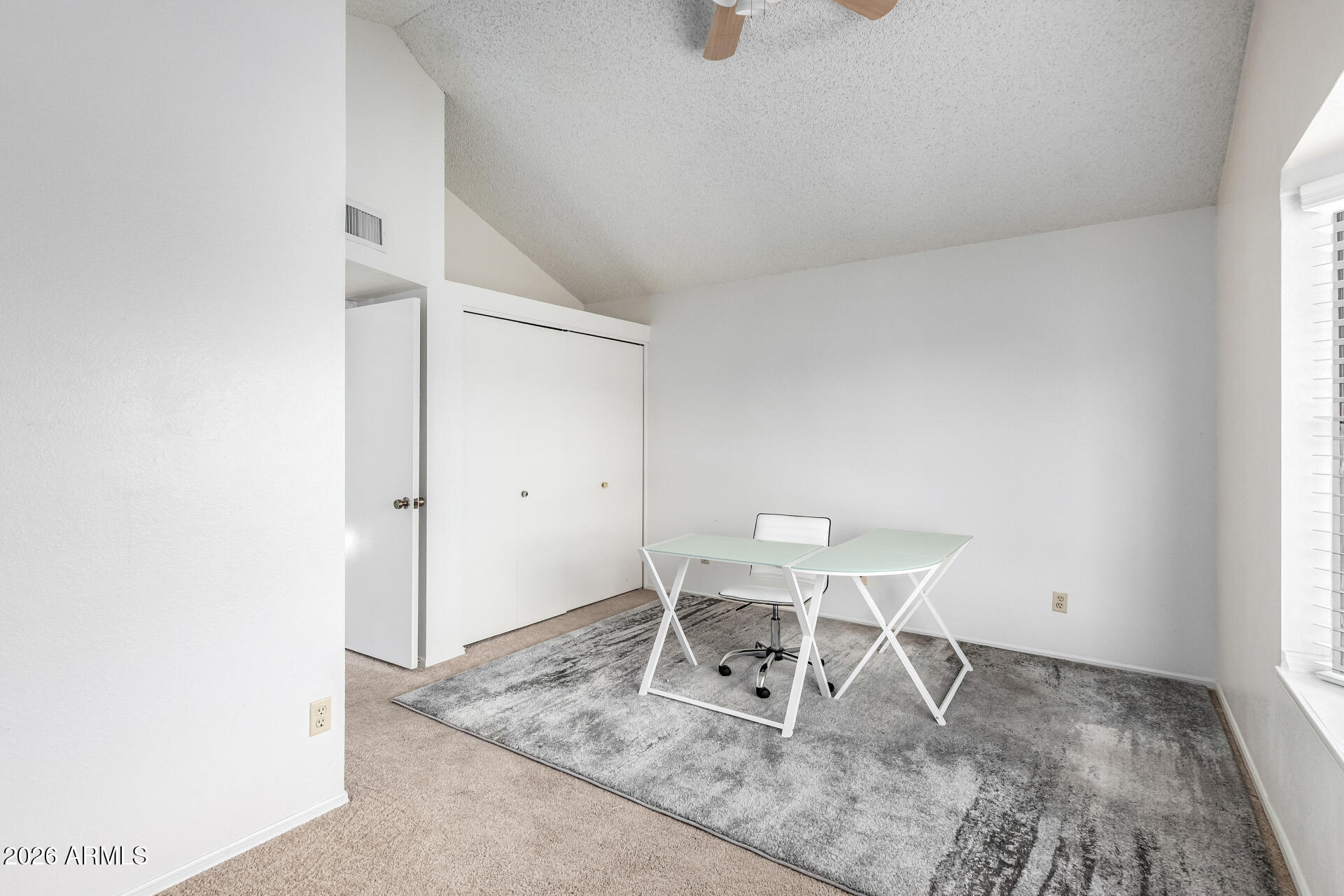 8111 West Wacker Road, Unit 13 Peoria, AZ 85381 - Photo 17 of 28 a dining room with a table and chairs