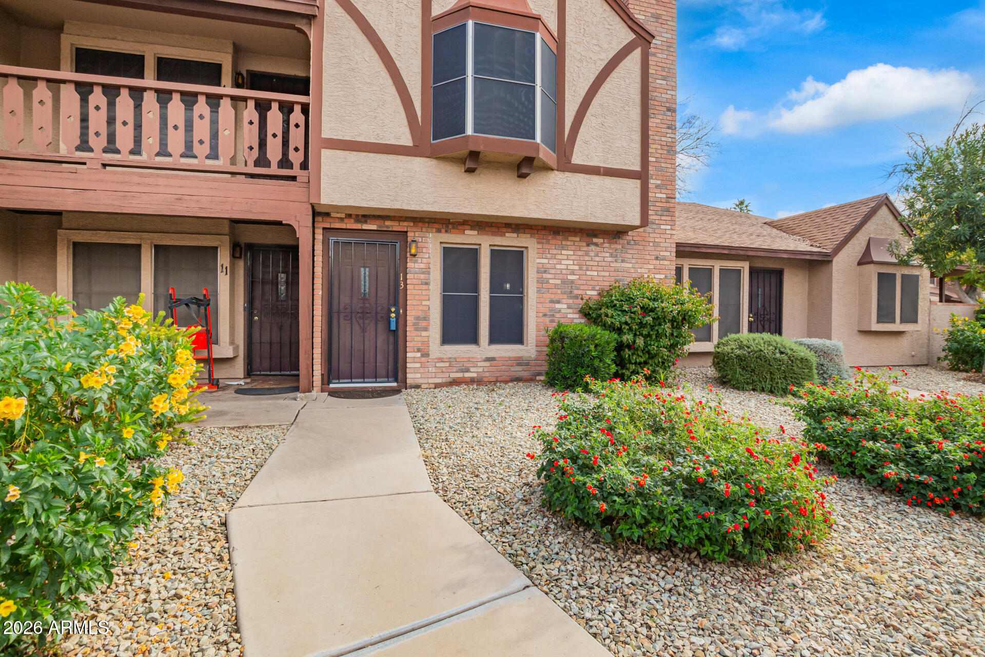 8111 West Wacker Road, Unit 13 Peoria, AZ 85381 - Photo 2 of 28 front view of a building