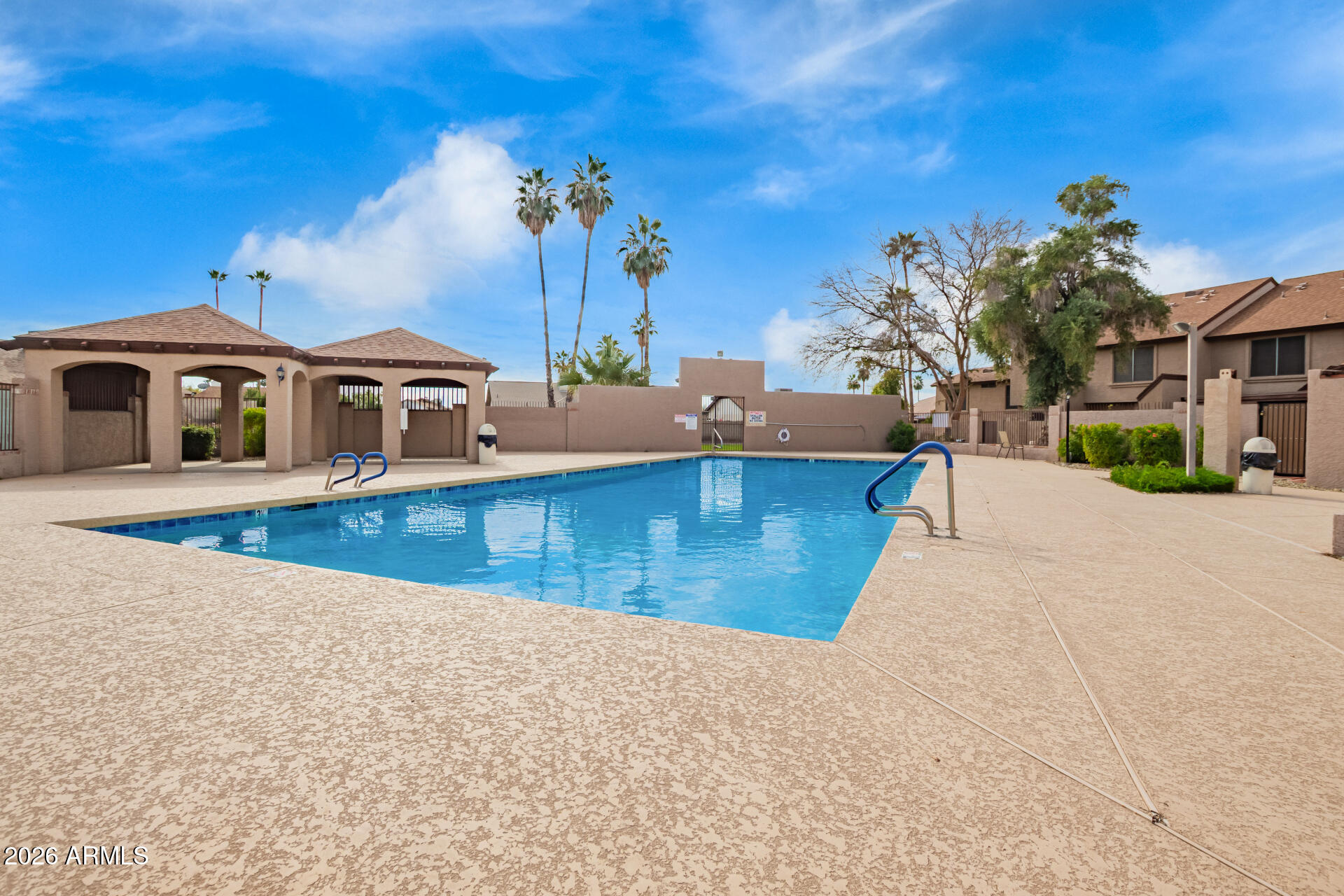 8111 West Wacker Road, Unit 13 Peoria, AZ 85381 - Photo 24 of 28 a view of a house with a yard