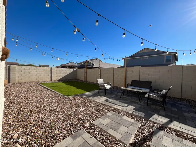 a garden view with a sitting space