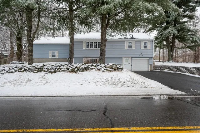 a view of white house with a snow