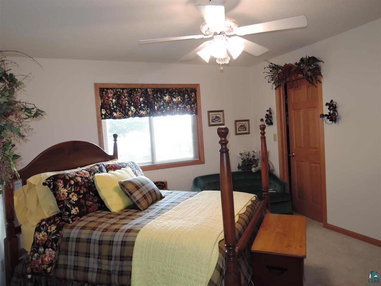 2865 Lake Road Barnes, WI 54873 - Photo 28 of 48 Master bedroom walk-in closet