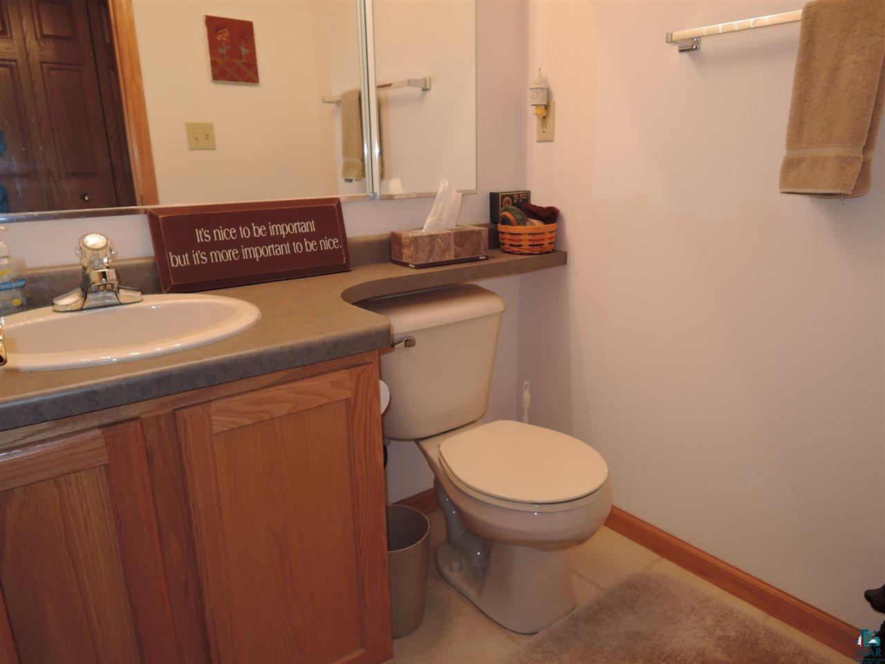 2865 Lake Road Barnes, WI 54873 - Photo 38 of 48 Half bath near attached garage