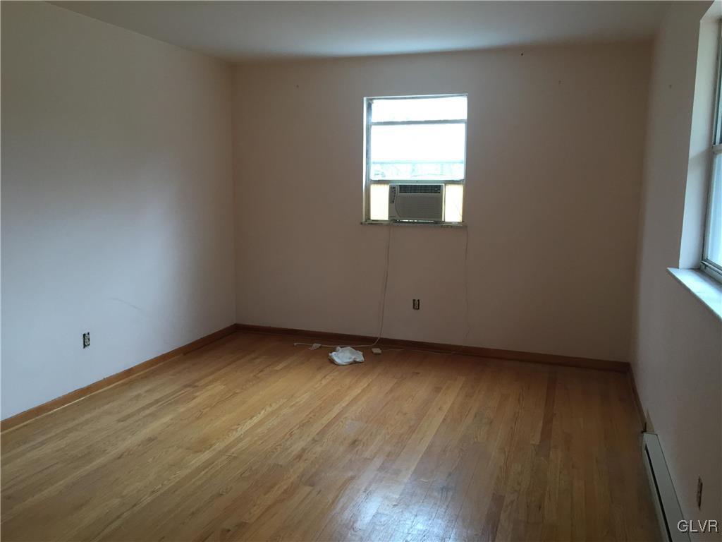 12 Foothill Road Albrightsville, PA 18210 - Photo 8 of 11 an empty room with wooden floor and windows
