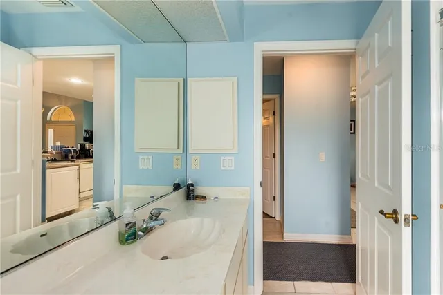 a bathroom with a bathtub and a sink