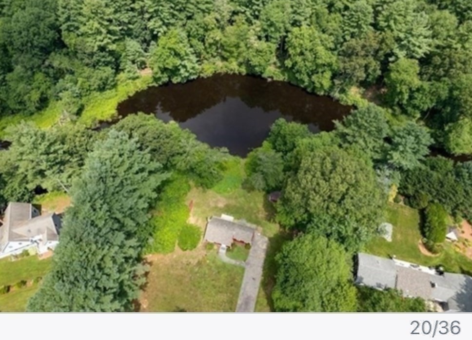 48 River Road Norfolk, MA 02056 - Photo 30 of 42 an aerial view of a house with a yard