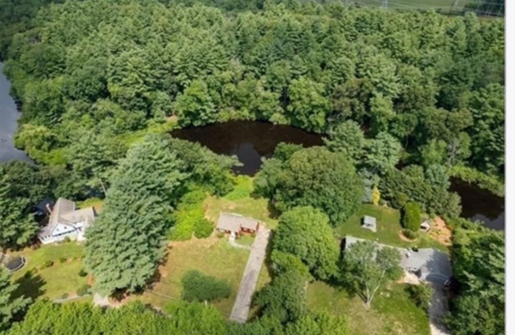 48 River Road Norfolk, MA 02056 - Photo 31 of 42 an aerial view of residential house with outdoor space and trees all around