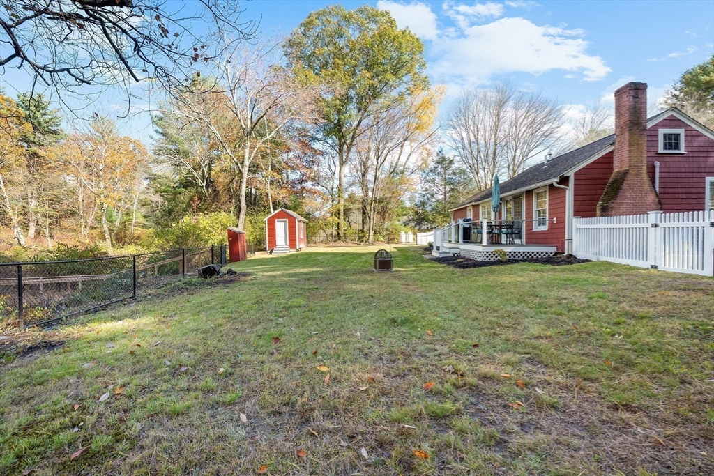 48 River Road Norfolk, MA 02056 - Photo 7 of 42 a view of outdoor space with garden and trees