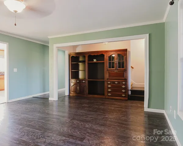 a storage room with wooden floor