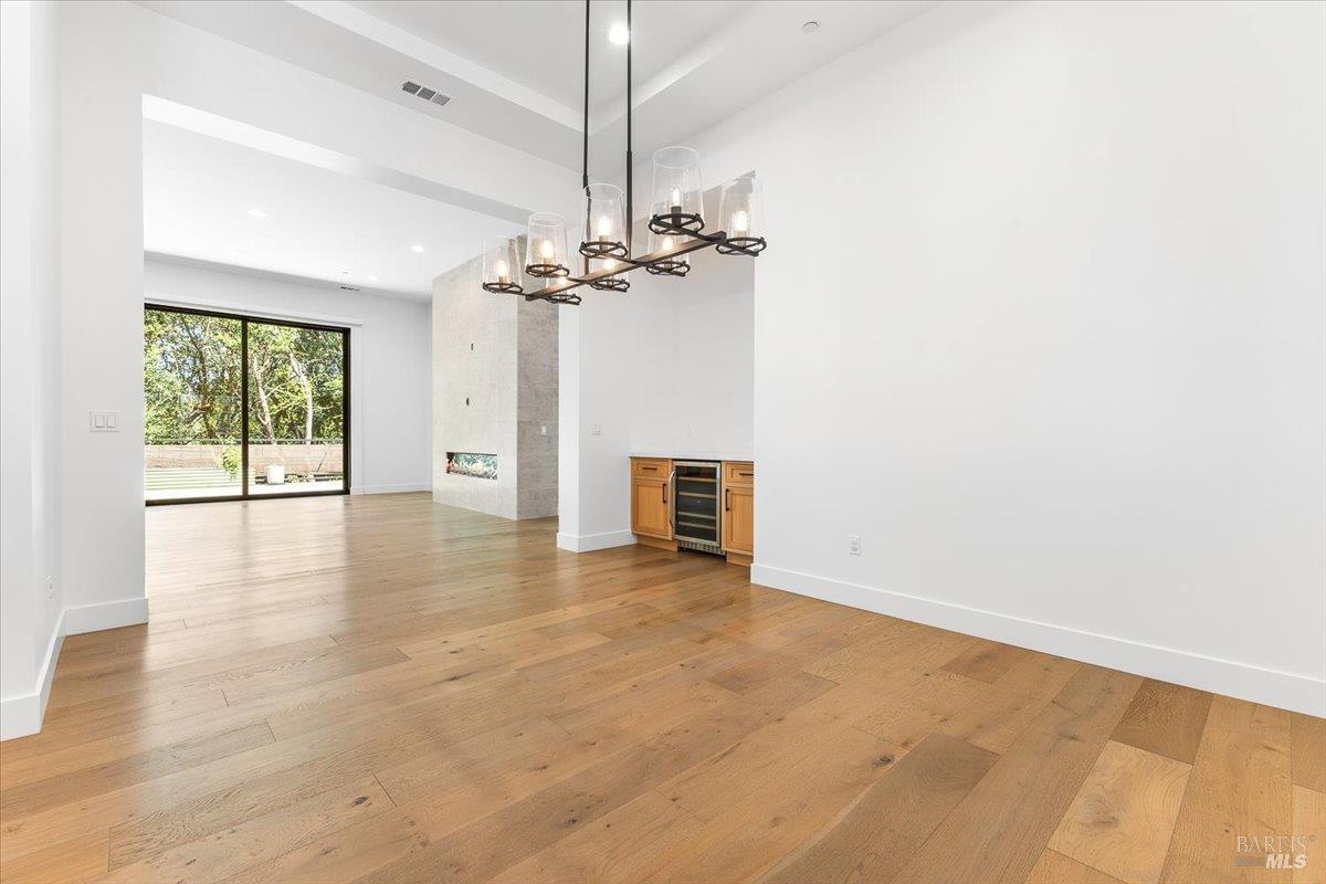 794 Los Olivos Road Santa Rosa, CA 95404 - Photo 16 of 59 an empty room with windows and fireplace