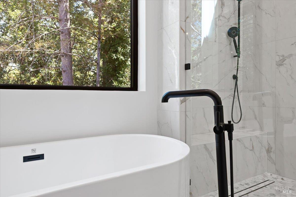 794 Los Olivos Road Santa Rosa, CA 95404 - Photo 27 of 59 a bathroom with a bathtub