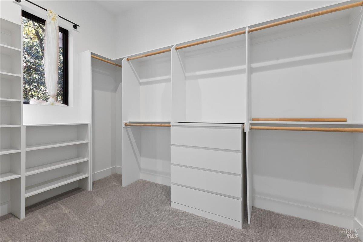 794 Los Olivos Road Santa Rosa, CA 95404 - Photo 28 of 59 a view of walk in closet with empty racks