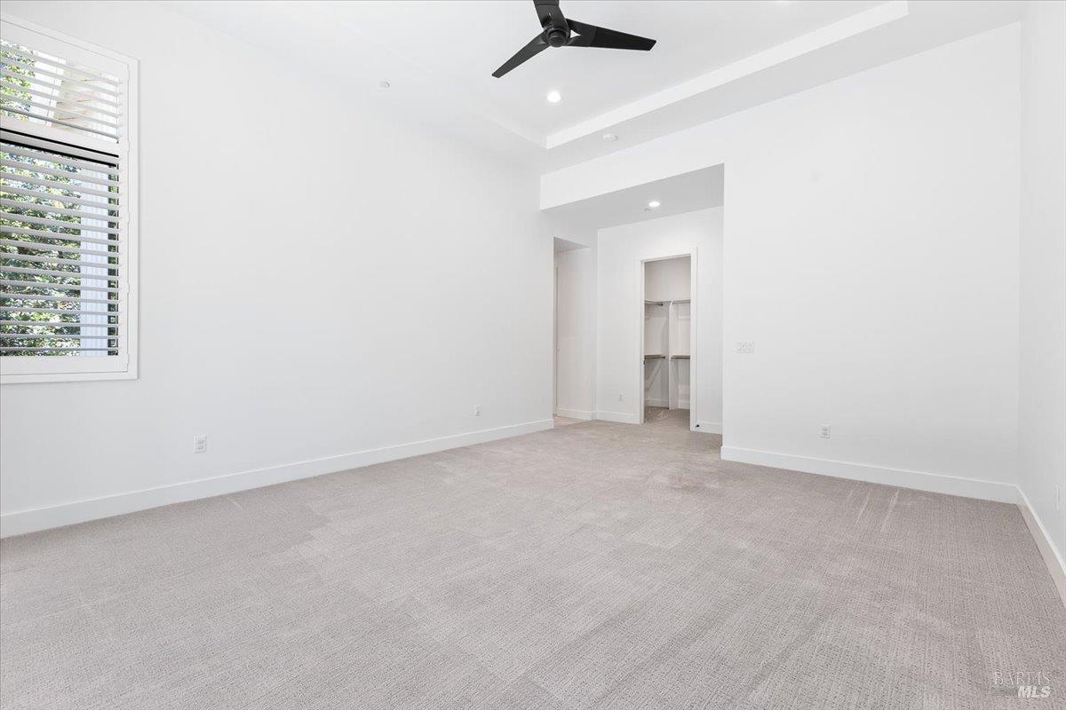 794 Los Olivos Road Santa Rosa, CA 95404 - Photo 31 of 59 an empty room with a windows and cabinet