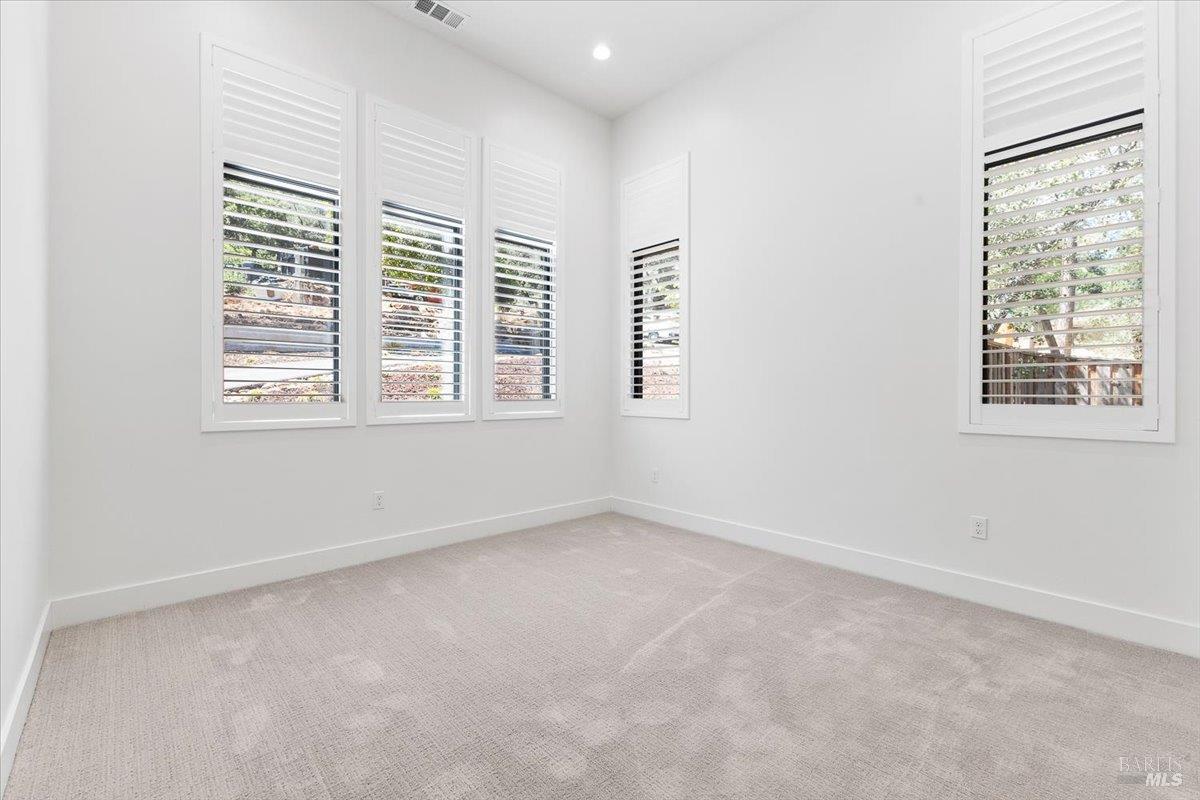 794 Los Olivos Road Santa Rosa, CA 95404 - Photo 36 of 59 an empty room with a window