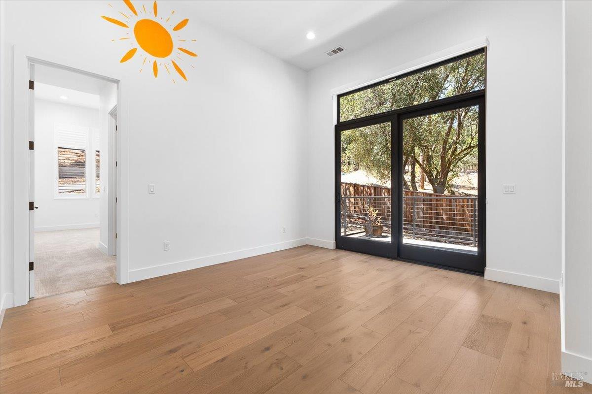 794 Los Olivos Road Santa Rosa, CA 95404 - Photo 40 of 59 a view of an empty room with glass door