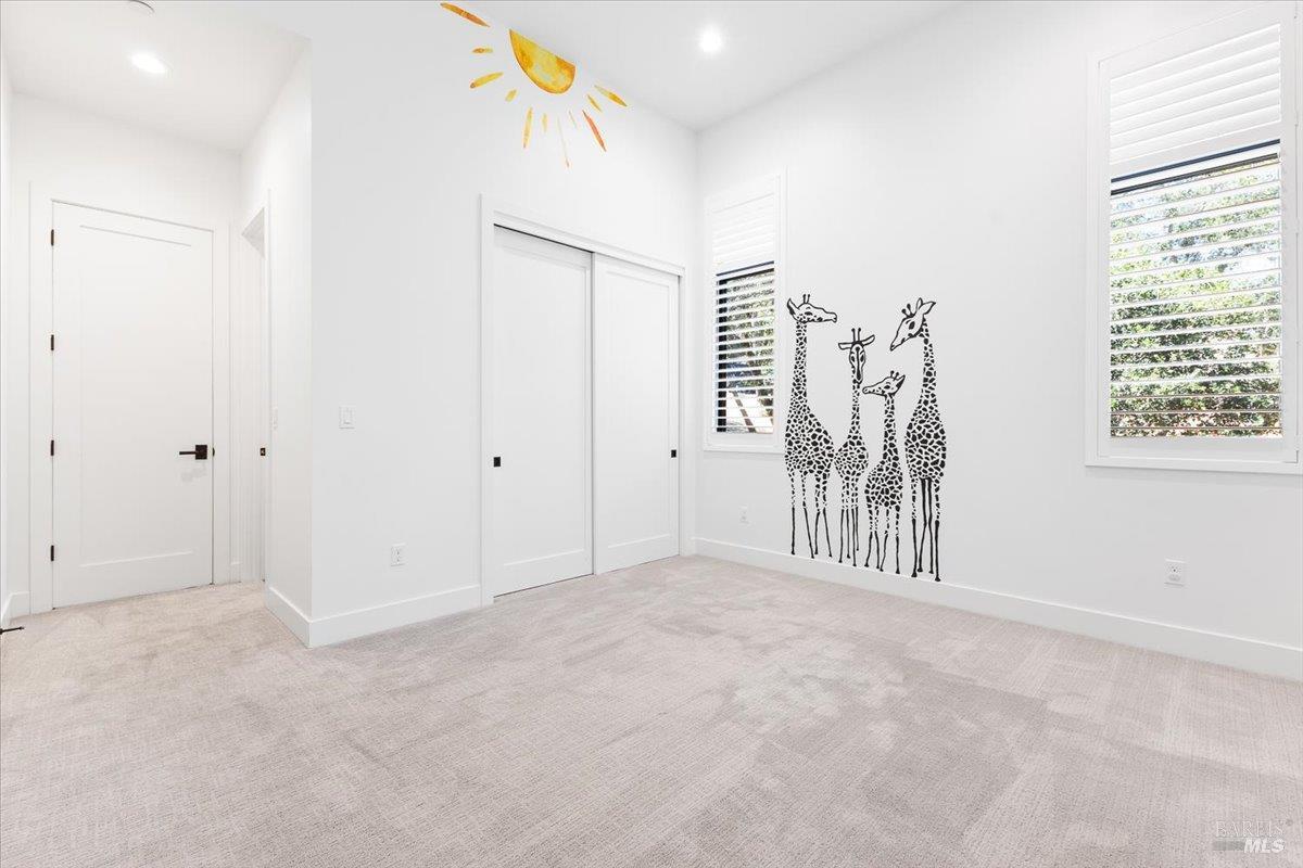 794 Los Olivos Road Santa Rosa, CA 95404 - Photo 42 of 59 a view of livingroom with hardwood floor and white walls