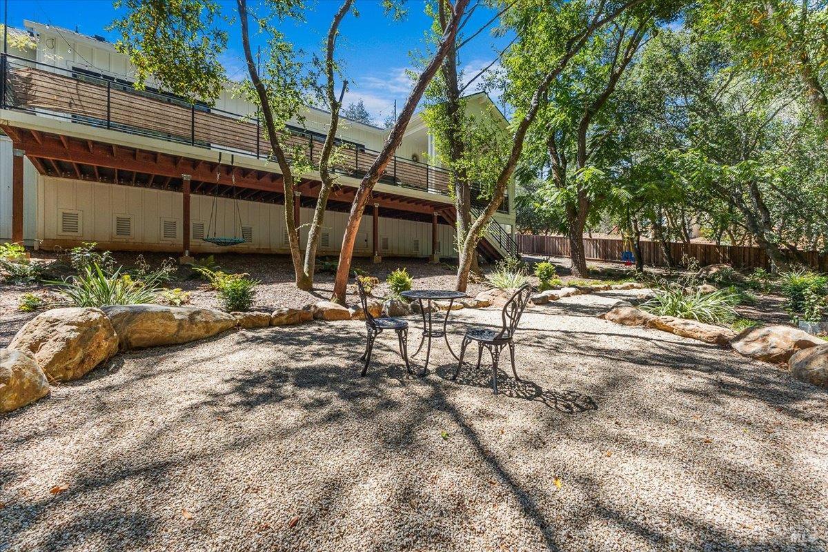 794 Los Olivos Road Santa Rosa, CA 95404 - Photo 51 of 59 a backyard of a house with table and chairs