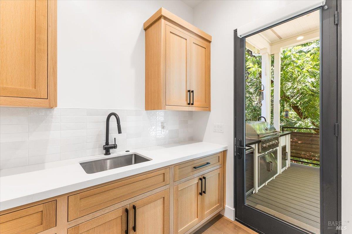 794 Los Olivos Road Santa Rosa, CA 95404 - Photo 8 of 59 a kitchen with stainless steel appliances a sink a stove and a window