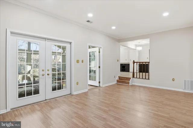 a view of a livingroom with wooden floor