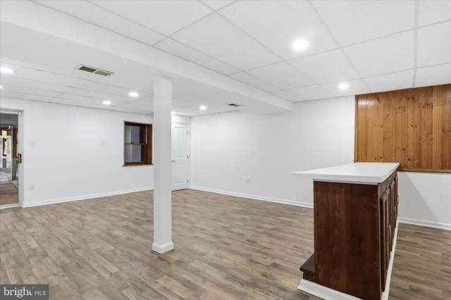 a view of kitchen with wooden floor