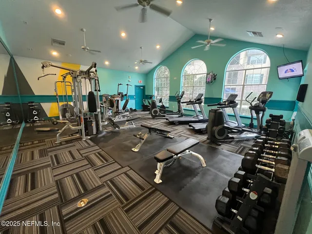 a room with lots of gym equipment